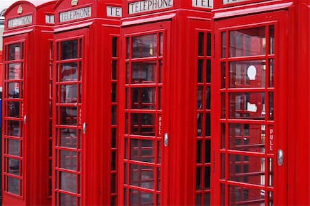 simsearch:400-05174392,k - Four classic London telephone cabins. London symbol Foto de stock - Royalty-Free Super Valor e Assinatura, Número: 400-04558743