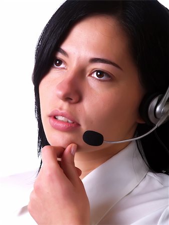 simsearch:400-04785322,k - A portrait about a young pretty information-desk lady with black hair who is smiling, she has a headphone, and she is wearing a white shirt and a black tie Stock Photo - Budget Royalty-Free & Subscription, Code: 400-04558760