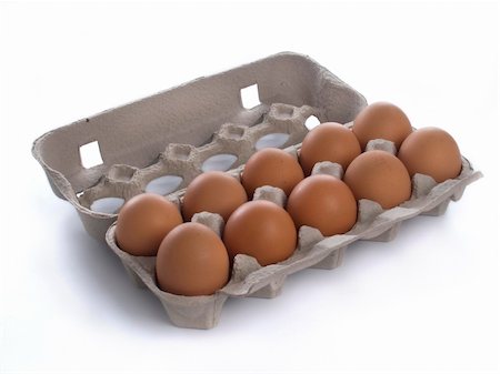 simsearch:400-04313912,k - Ten eggs in carton box on white background Stockbilder - Microstock & Abonnement, Bildnummer: 400-04559216