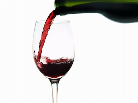 Red wine pouring into a wine glass on white background Foto de stock - Super Valor sin royalties y Suscripción, Código: 400-04559213