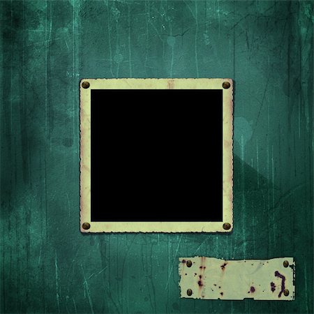simsearch:400-04058991,k - old photo frame on the green wall Stock Photo - Budget Royalty-Free & Subscription, Code: 400-04559424