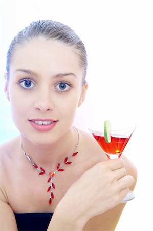 high-key portrait of young woman with cocktail  in multicolor back lights. Image may contain slight multicolor aberration as a part of design Stock Photo - Budget Royalty-Free & Subscription, Code: 400-04559443