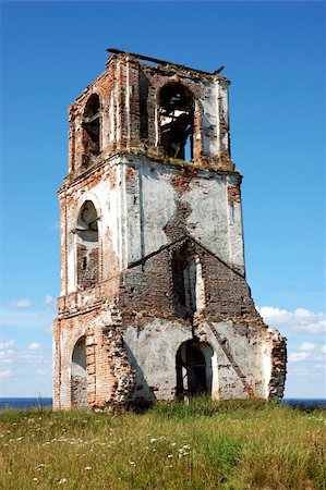 simsearch:400-06526519,k - Ruins of ancient country bell tower near lake in Kargopol, north Russia Stock Photo - Budget Royalty-Free & Subscription, Code: 400-04559521