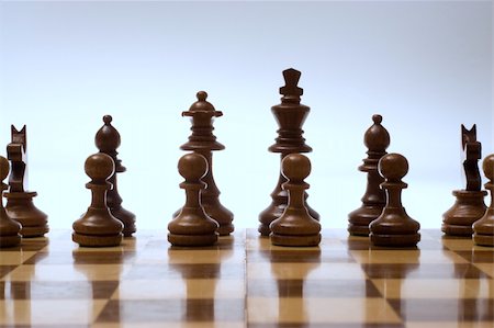 simsearch:400-04811369,k - Chess game piting black against white in a game of skill and intelligence. Stock Photo - Budget Royalty-Free & Subscription, Code: 400-04559686