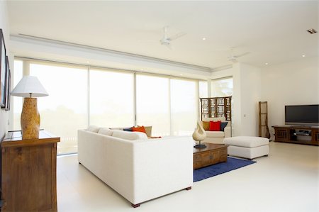 elegant tv room - Panoramic view of nice light living room Foto de stock - Super Valor sin royalties y Suscripción, Código: 400-04559722