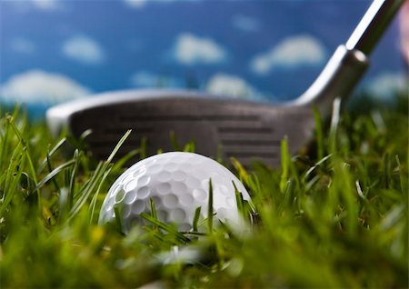 range shooting - Golf ball on tee in grass. Foto de stock - Super Valor sin royalties y Suscripción, Código: 400-04550491
