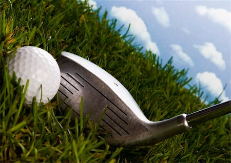 range shooting - Golf ball on tee in grass. Stock Photo - Budget Royalty-Free & Subscription, Code: 400-04550505