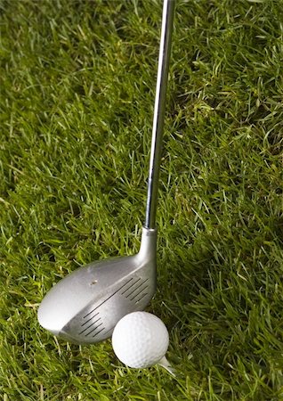 range shooting - Golf ball on tee in grass. Foto de stock - Super Valor sin royalties y Suscripción, Código: 400-04550518