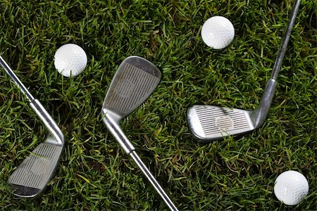 range shooting - Golf ball on tee in grass. Foto de stock - Super Valor sin royalties y Suscripción, Código: 400-04550600