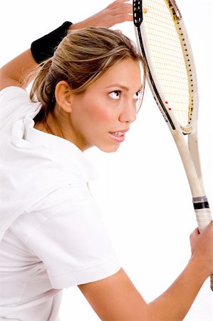 simsearch:649-05648783,k - side view of young woman ready to play tennis with white background Stock Photo - Budget Royalty-Free & Subscription, Code: 400-04551455