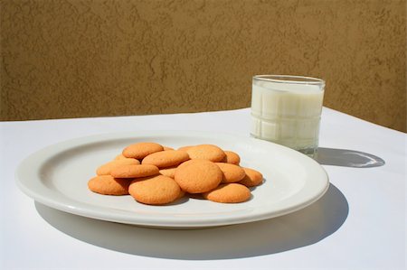 Close up of vanilla cookies and a glass of milk. Stock Photo - Budget Royalty-Free & Subscription, Code: 400-04551520