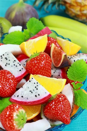 simsearch:400-04763797,k - Delicious fresh fruits in bowl as dessert Foto de stock - Royalty-Free Super Valor e Assinatura, Número: 400-04551612