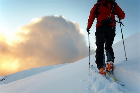 simsearch:400-04359682,k - Backcountry skier walks in the snow at sunset, italian alps, europe. Stock Photo - Budget Royalty-Free & Subscription, Code: 400-04551745