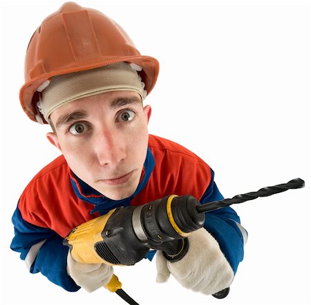 Laborer on the helmet with drill on a white background Stock Photo - Budget Royalty-Free & Subscription, Code: 400-04551748