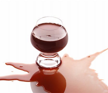 The spilled red wine. Wine poured on a surface, is isolated on a white background Stock Photo - Budget Royalty-Free & Subscription, Code: 400-04552011