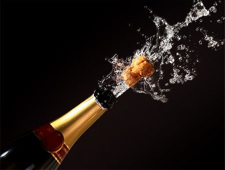 popping up - champagne bottle with shotting cork background Stock Photo - Budget Royalty-Free & Subscription, Code: 400-04552042