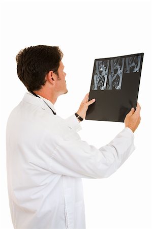 simsearch:400-05088218,k - Rear view of a doctor reading a patient's MRI results.  Isolated on white. Stock Photo - Budget Royalty-Free & Subscription, Code: 400-04552595