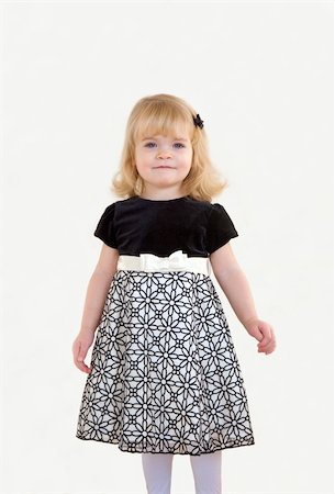 A Little Girl Dressed Up in a Formal Dress Foto de stock - Super Valor sin royalties y Suscripción, Código: 400-04552674