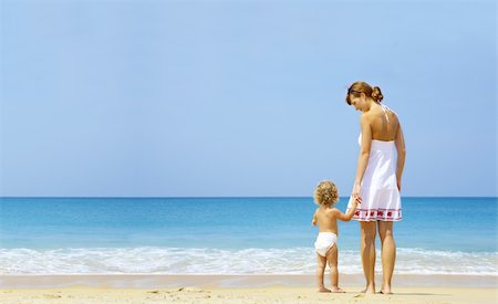 simsearch:400-04062793,k - Portrait of young mother with her baby  having fun on the beach Photographie de stock - Aubaine LD & Abonnement, Code: 400-04552889