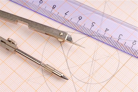 drafting tool - Macro of geometry tools lying on drawing Stock Photo - Budget Royalty-Free & Subscription, Code: 400-04552923