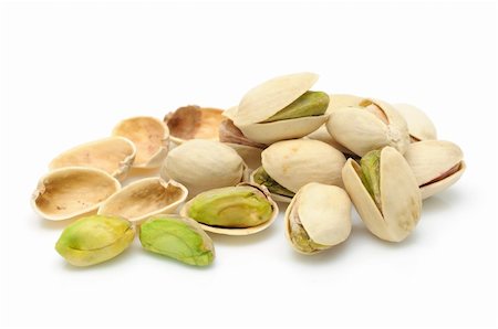 pistachio kernel - Heap of pistachios nuts in isolated white background Stock Photo - Budget Royalty-Free & Subscription, Code: 400-04553952