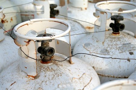 rusting tank - The top of a bunch of propane tanks. Stock Photo - Budget Royalty-Free & Subscription, Code: 400-04564032