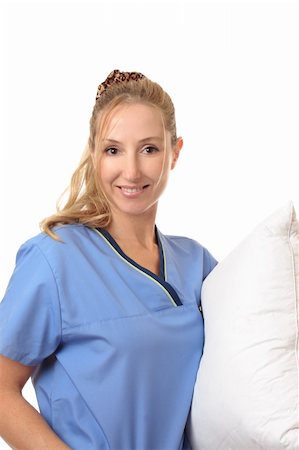 Smiling nurse wearing a  blue scrub uniform Stock Photo - Budget Royalty-Free & Subscription, Code: 400-04564104