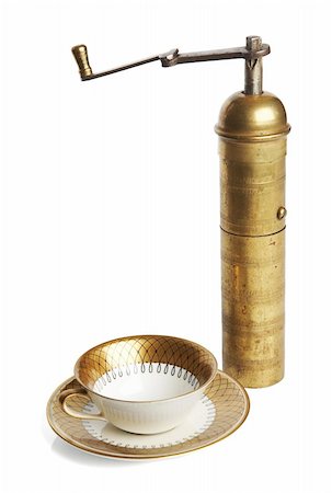 simsearch:700-07110453,k - Elegant coffee cup and old brass manual mill (with clipping path) Stockbilder - Microstock & Abonnement, Bildnummer: 400-04564138