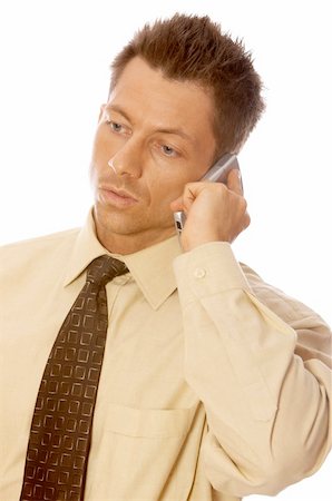 Portrait of handsome businessman is talking cell phone Stock Photo - Budget Royalty-Free & Subscription, Code: 400-04564252
