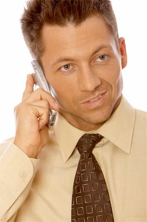 Portrait of handsome businessman is talking cell phone Stock Photo - Budget Royalty-Free & Subscription, Code: 400-04564253
