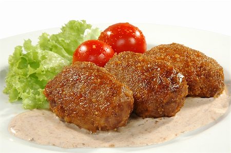 snacks and salads recipes - cutlets, sauce, tomatos and salad Stock Photo - Budget Royalty-Free & Subscription, Code: 400-04564361