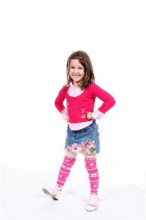 sparkmom (artist) - Stylish little girl in pink striped tights and a patterened short denim skirt. Foto de stock - Super Valor sin royalties y Suscripción, Código: 400-04564444