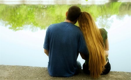 dundanim (artist) - Romantic couple hugging and sitting on lakeside Foto de stock - Royalty-Free Super Valor e Assinatura, Número: 400-04564452