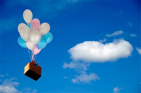 simsearch:400-04018001,k - Helium balloons is lifting basket with people. Foto de stock - Royalty-Free Super Valor e Assinatura, Número: 400-04564615