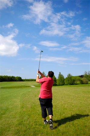 simsearch:400-03975619,k - Man is playing golf on a hot summer day. Stock Photo - Budget Royalty-Free & Subscription, Code: 400-04564611