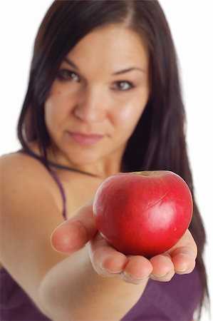attractive brunette woman with apple on white background Stock Photo - Budget Royalty-Free & Subscription, Code: 400-04564926