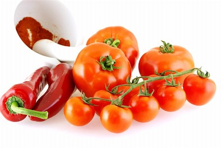 Lots of different tomatoes and red paprika over white background Foto de stock - Super Valor sin royalties y Suscripción, Código: 400-04565062