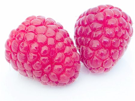 A fresh raspberries over white background Stockbilder - Microstock & Abonnement, Bildnummer: 400-04565362