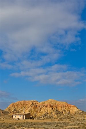 simsearch:400-04442144,k - Old shanty under the cloudy sky in spring season Fotografie stock - Microstock e Abbonamento, Codice: 400-04565489