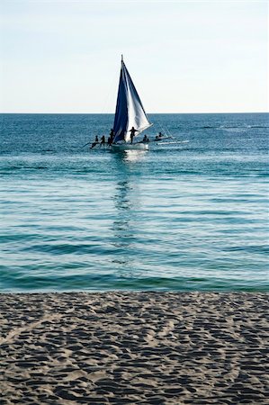 traditional filipino banka, outrigger style sailing boat, in the waters off boracay island in the philippines Stock Photo - Budget Royalty-Free & Subscription, Code: 400-04565702