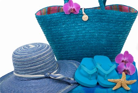 Colorful summer beachwear, flipflops, towel, bag, hat, orchids and starfish Foto de stock - Royalty-Free Super Valor e Assinatura, Número: 400-04566316