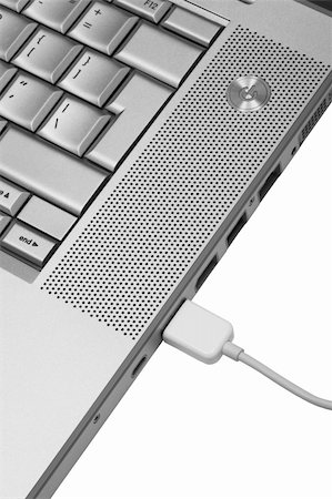simsearch:400-06857713,k - Connection to modern laptop on a white background Fotografie stock - Microstock e Abbonamento, Codice: 400-04566602