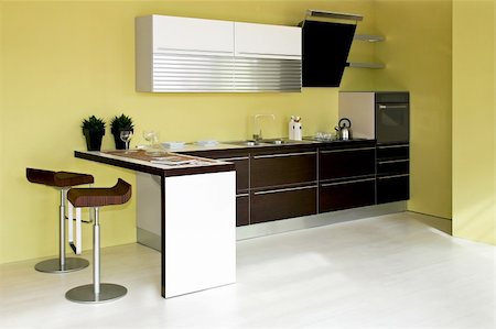 simsearch:400-08315056,k - Contemporary brown kitchen furniture and green walls Fotografie stock - Microstock e Abbonamento, Codice: 400-04566828