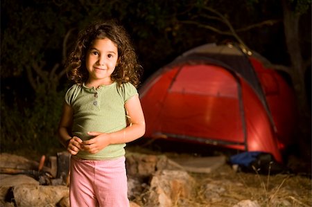 little girl at a camp at night with a red tent Stock Photo - Budget Royalty-Free & Subscription, Code: 400-04566885