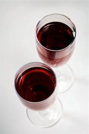 Two beautiful fashionable glasses with red wine Stock Photo - Budget Royalty-Free & Subscription, Code: 400-04566958