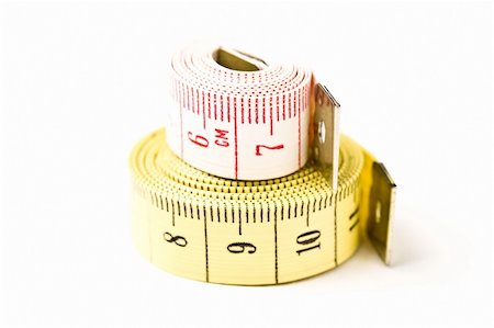 selectphoto (artist) - White & Yellow Measuring Tapes coiled & stacked Stock Photo - Budget Royalty-Free & Subscription, Code: 400-04567168