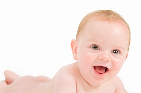 simsearch:400-07211187,k - close-up portrait of a smiling six months old baby isolated on white Photographie de stock - Aubaine LD & Abonnement, Code: 400-04567874