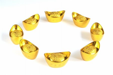 Strengthening Chinese Yuan Symbolized Through Gold Ingots Stock Photo - Budget Royalty-Free & Subscription, Code: 400-04568226