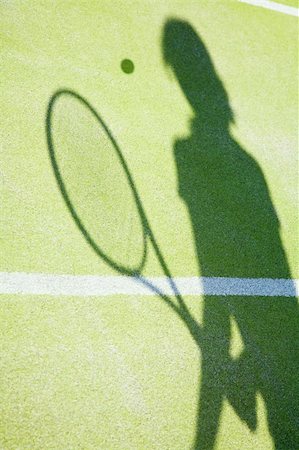 simsearch:400-04067347,k - shadow on tennis court of woman hitting the ball Foto de stock - Super Valor sin royalties y Suscripción, Código: 400-04568408