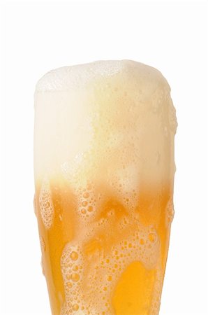 pouring wheat - beer foam under glass on white background with path Stock Photo - Budget Royalty-Free & Subscription, Code: 400-04568435